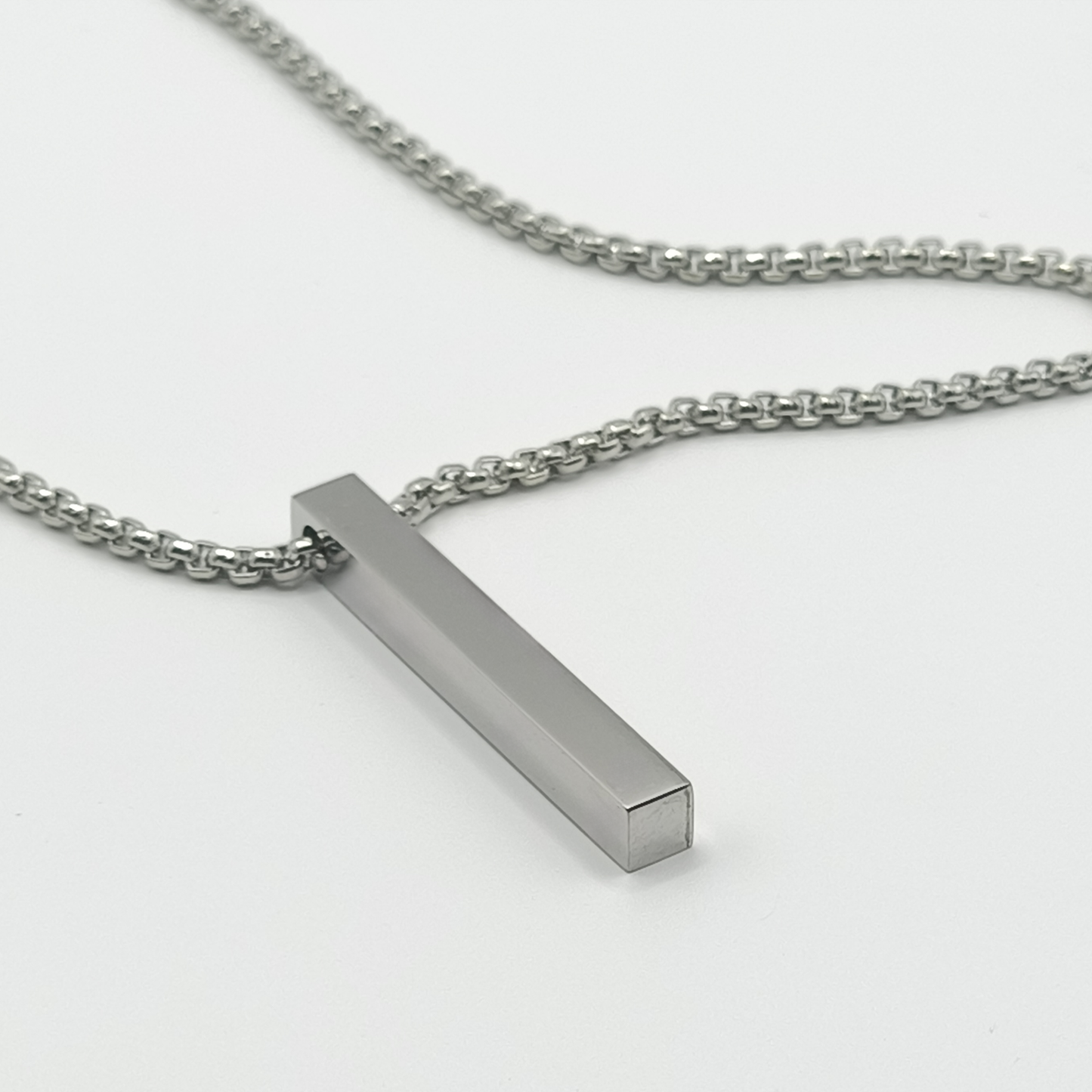 Colgante lingote fino plateado texto